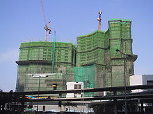 Bamboo used as scaffolding in skyscrapers high rises China Asia